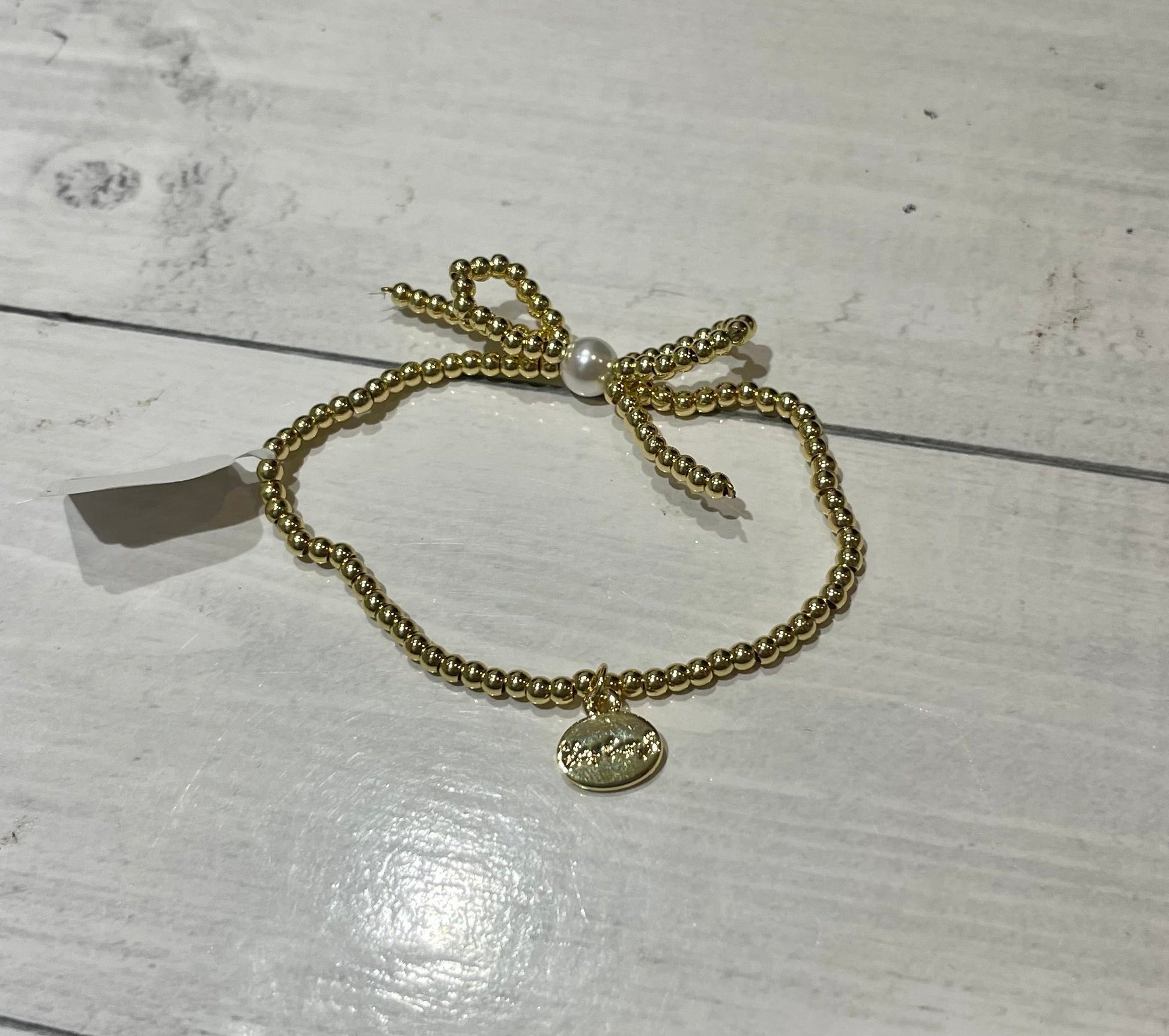 AC Bow and Pearl Bracelet - Ballyhoo Boutique and Gift