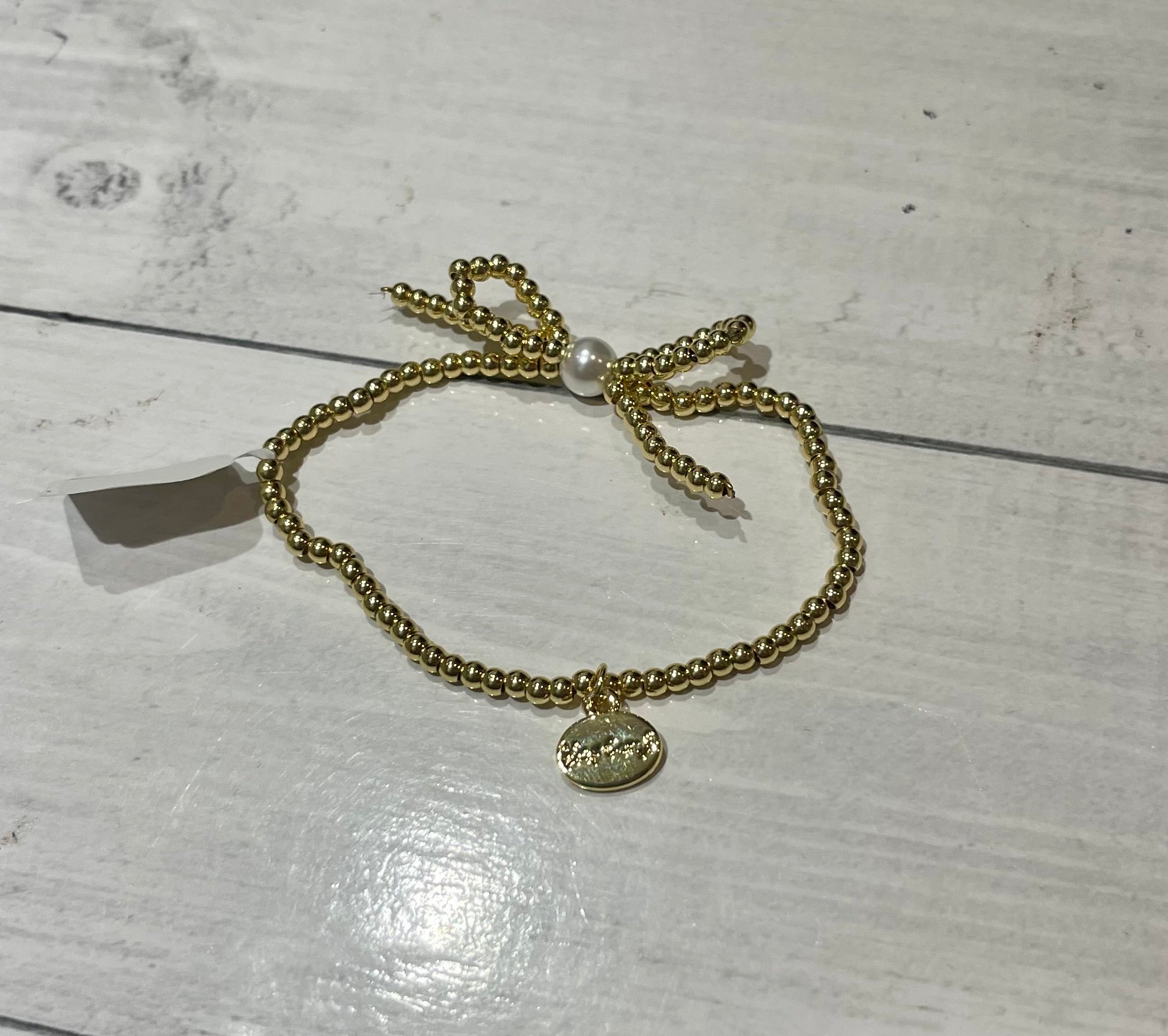 AC Bow and Pearl Bracelet - Ballyhoo Boutique and Gift