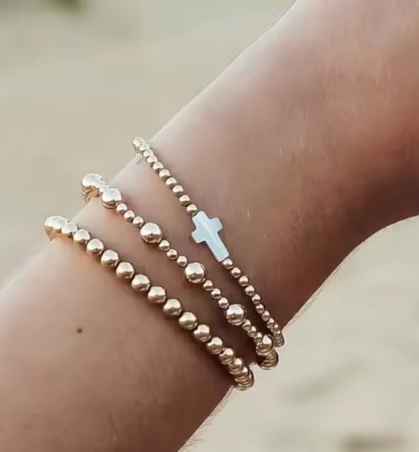 Gold Bead White Cross Bracelet - Ballyhoo Boutique and Gift